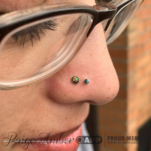 allthepiercingsandbodymods:Double nostril piercing by piercingsbypaigeamber. Follow her on Instagram