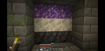 whycraft:[ID: A stronghold 3x3 doorway that is covered by an amethyst geode. The