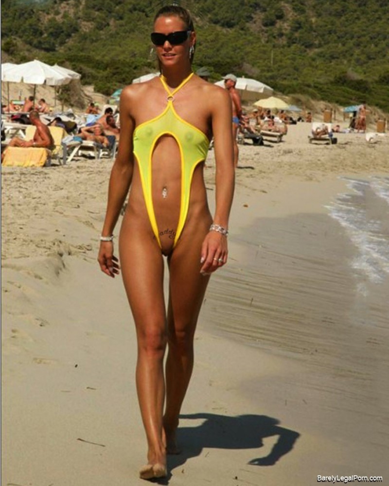 carelessinpublic:In a micro crotchless bikini and showing her pussy