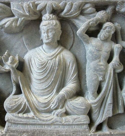 Fragment of a Gandhara panel showing Buddha and Herakles (as Vajrapāṇi). Kushan, Hellenistic, 2ndC-3