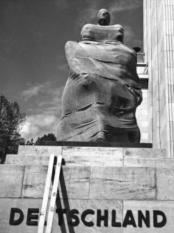 casadabiqueira:  France, Paris, World Fair. Before the opening of the German Pavilion. Statue by the sculptor Josef Thorak. Herbert List, 1937 