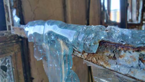 destroyed-and-abandoned:  Glass that melted during a fire. 