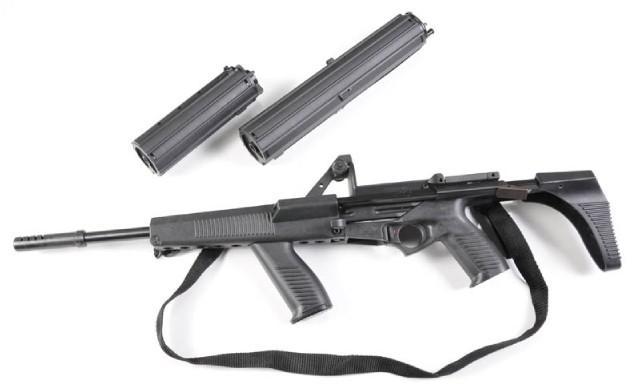 gunrunnerhell:  Calico M-951 The rather bizarre looking 9x19mm carbine with its unique