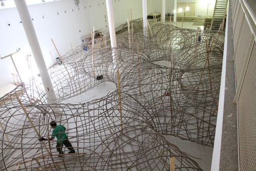 littlelimpstiff14u2:  Artist Henrique Oliveira Constructs a Cavernous Network of Repurposed Wood Tunnels at MAC USP Brazilian artist Henrique Oliveira (previously) recently completed work on his largest installation to date titled Transarquitetônica