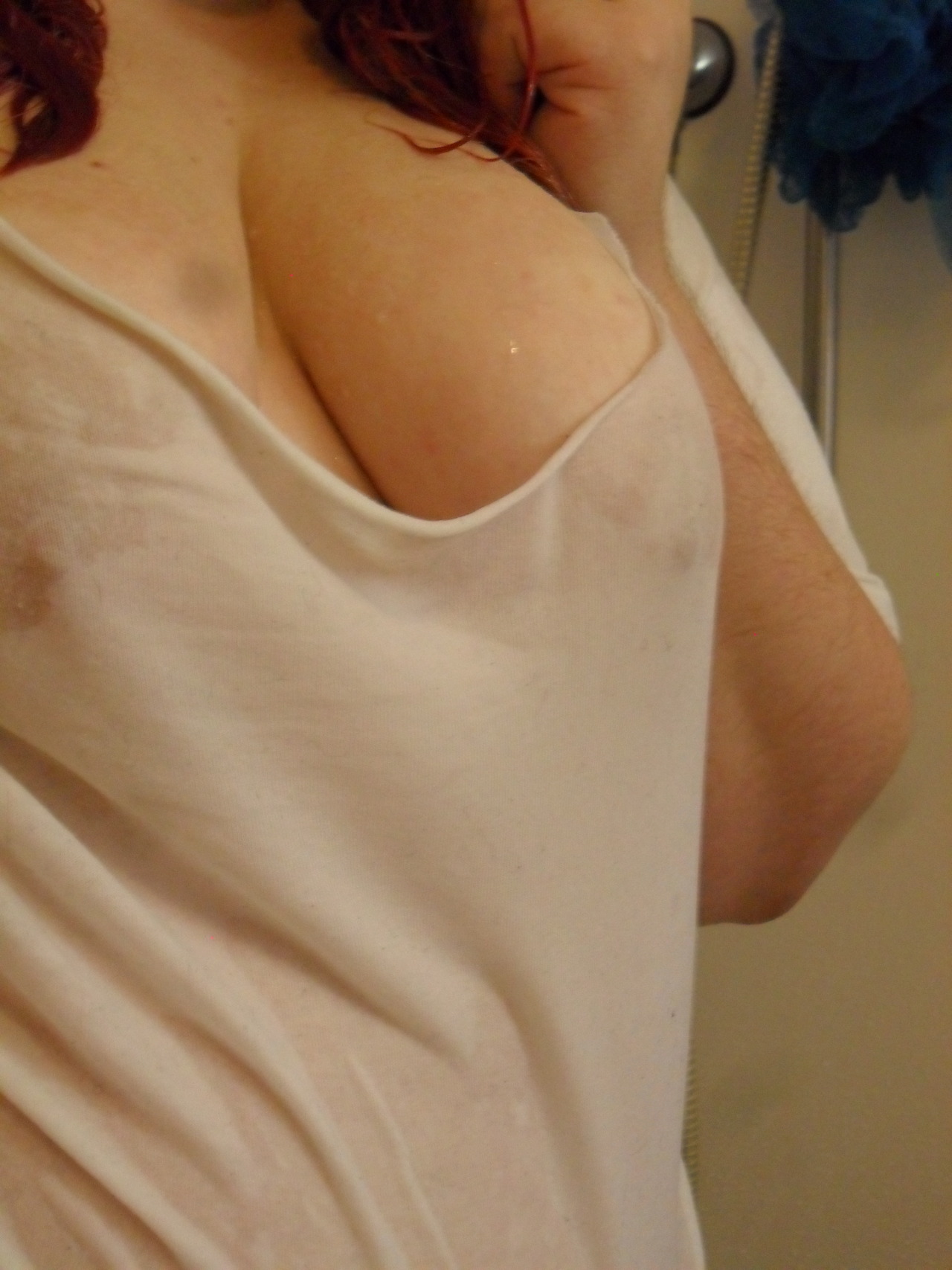 kittenwantscream:  Awkward as hell looking but I had a request for wet tshirt pics!