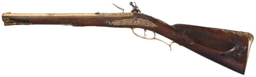 Extraordinary gilded brass ornate relief flintlock musket crafted by Iohan Adam Knod of Carlsbad, ci