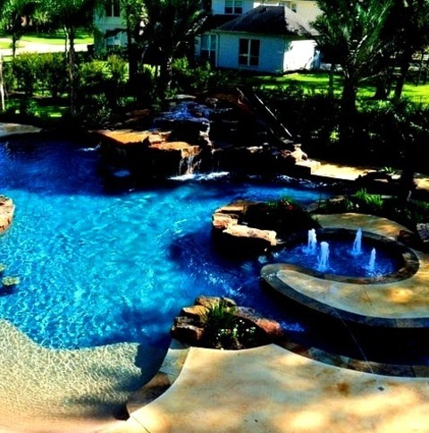 Houston Modern PoolLarge Modern Backyard Pool Fountain Design Featuring Stamped Concrete And A Custom-shaped
