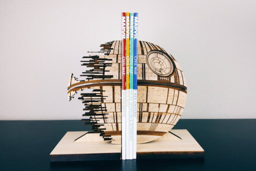 mymodernmet: Playful Pop Culture-Inspired Bookends Bring Intergalactic Fun to Your Shelf