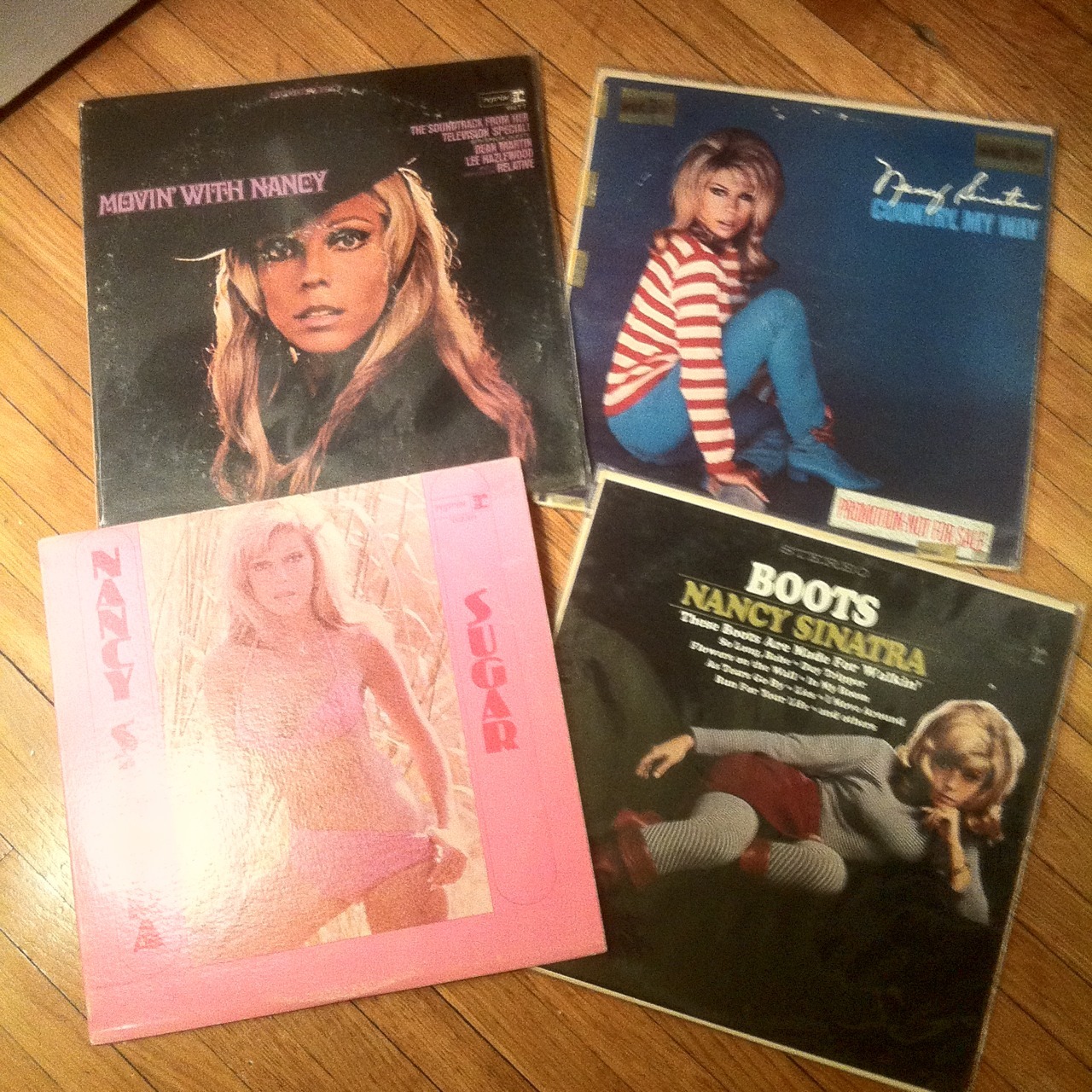 coppertop-fox:  My [imcomplete] Nancy Sinatra collection. Looking smoking hot on