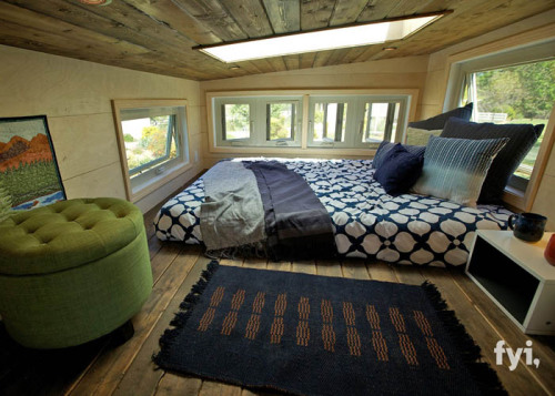 tinyhousetown:  A southwest styled tiny house on wheels with two lofts and bike storage 