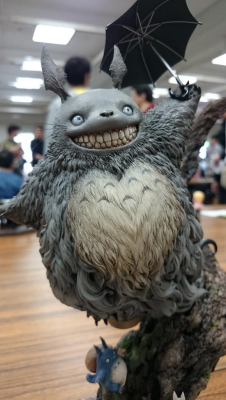 archiemcphee:  Of all the Totoros we’ve seen over the years, this awesomely detailed manic Totoro is almost certainly the creepiest. With a grin that would impress the Cheshire Cat and billowing fur that suggests he might be a ghost, this stunning My