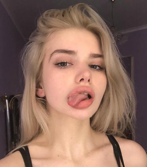 just-sexy-lips:Licking her lips getting readyDumb Stupid bitch is only worth a huge cock in her mout