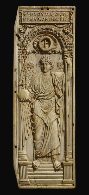 ancientpeoples:Carved ivory panel, originally part of a diptych, showing the archangel Michael, and 