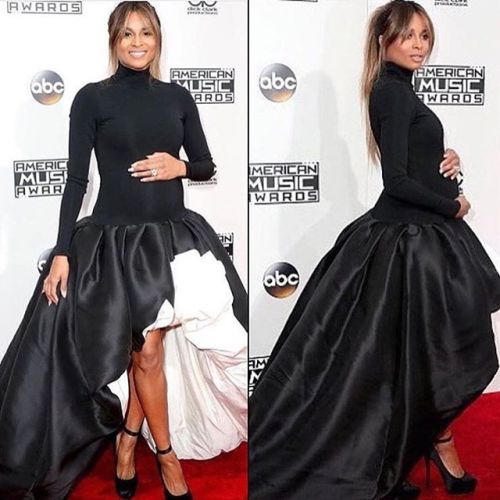 @ciara and her baby bump were glowing on the red carpet for the AMAs in a black and white @stephaner