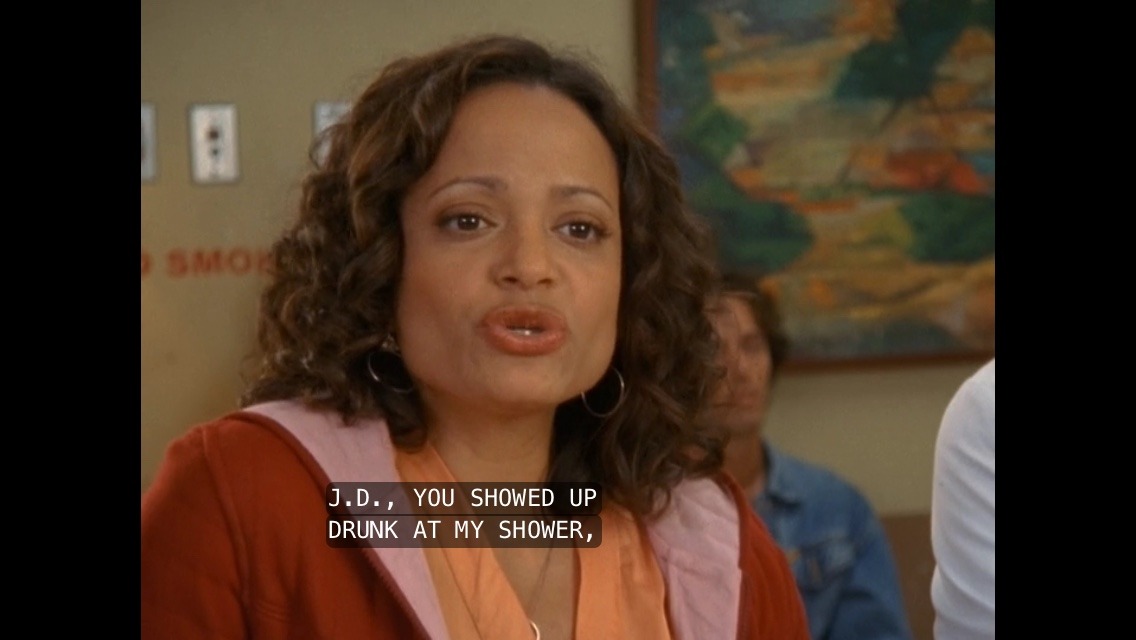 [Image description a scene from Scrubs featuring JD and Carla, with