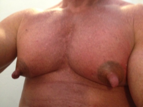 He is one very handsome man and with exceptional pecs and awesome nips!  WOOF