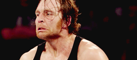 gauna-03:   Dean Ambrose goes into lunatic shirtless mode. 