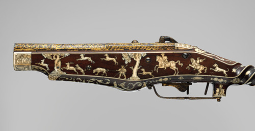 An ornate double barrel wheel-lock pistol crafted by Peter Peck for the Holy Roman Emperor Charles V