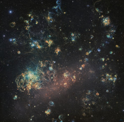 itscolossal:Photograph of Multicolored “Cloud” Galaxy by Amateur Photographers Combines 1,060 Hours of Exposure