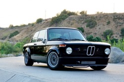 darkinternalthoughts:  johnnybee:  motoriginal:  1974 BMW 2002tii modestly modded with E21 interior.   Classy  The only Beemer I ever wanted to own. 