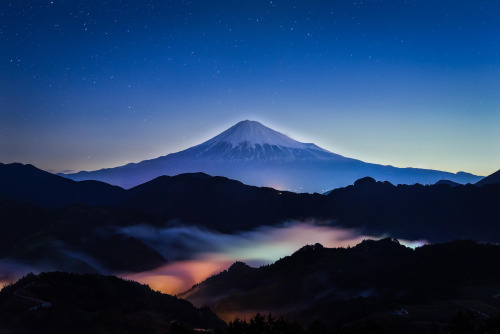 earth-land:  Mount Fuji - Japan   Rising 3776 meters above sea level, Mount Fuji is Japan’s tallest mountain and most iconic landmark. Images of the nearly perfect, solitary volcano have appeared in paintings, wood block prints and other artworks for