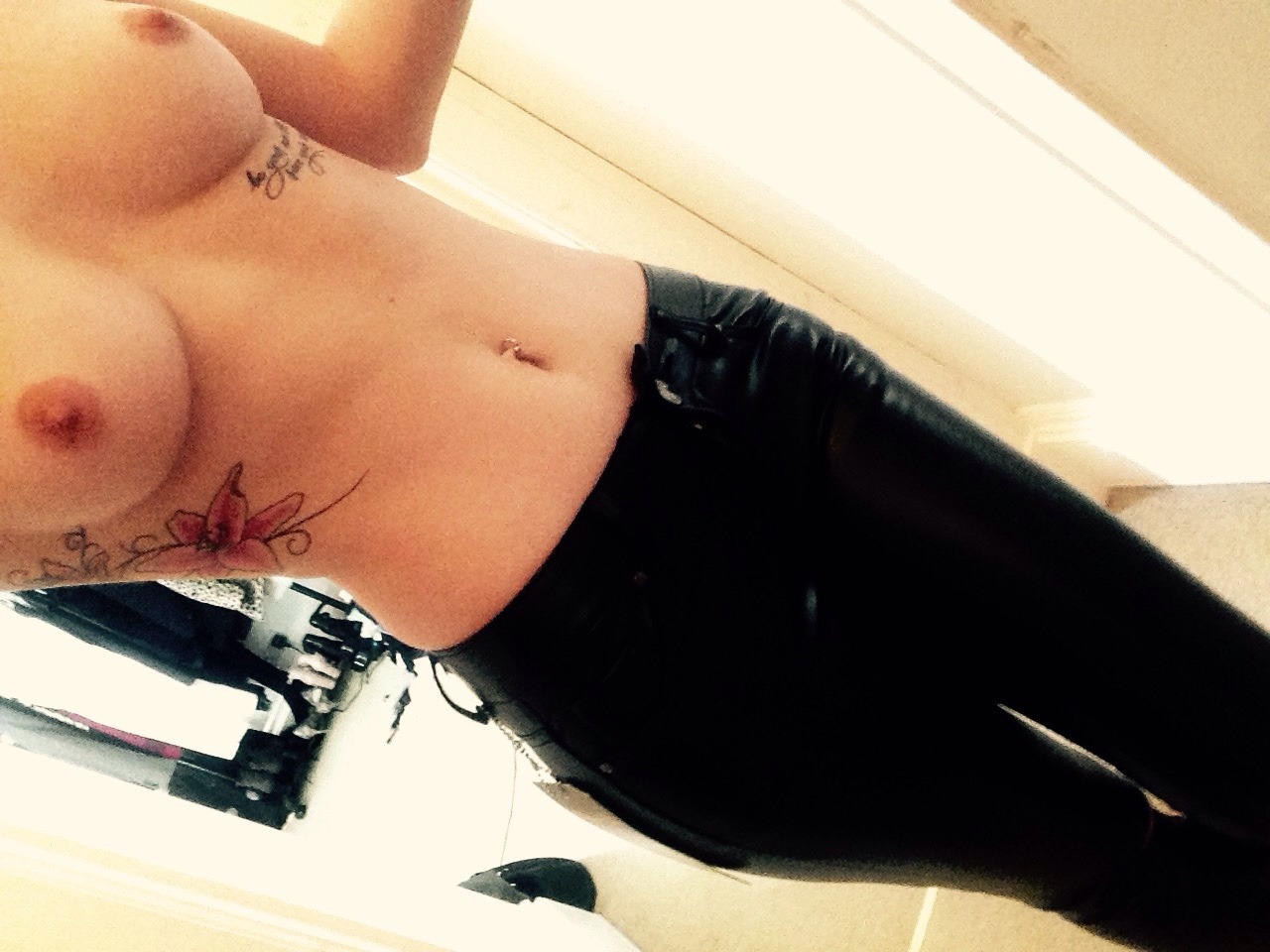 rosesaretimeless:  New leather trousers. Oh and a bit of boob 👀