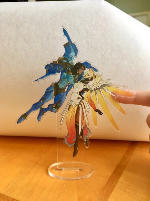 lessamao: I made a pharmercy stand because I’m gay. Mercy’s wings are see through c:  gonna kick of my acrylic printing shop tonight for all you lovely artist out there!   You can buy this one on my shop:  Etsy.com/shop/lessaselig 