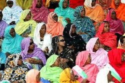 lifeofasomali:  Somali women in traditional garbasaar; a colorful shawl mainly worn by married women.  