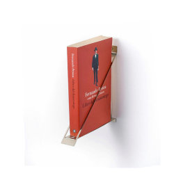 etsy:  For the true minimalist: Book shelf for one book by Tumai.  rad