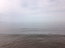 loocoz:  I’m at the beach and you can hardly see where the sea ends and the sky starts because it’s so foggy.