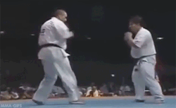 Mma-Gifs:   Battle Of Spinning Wheel Kicks  