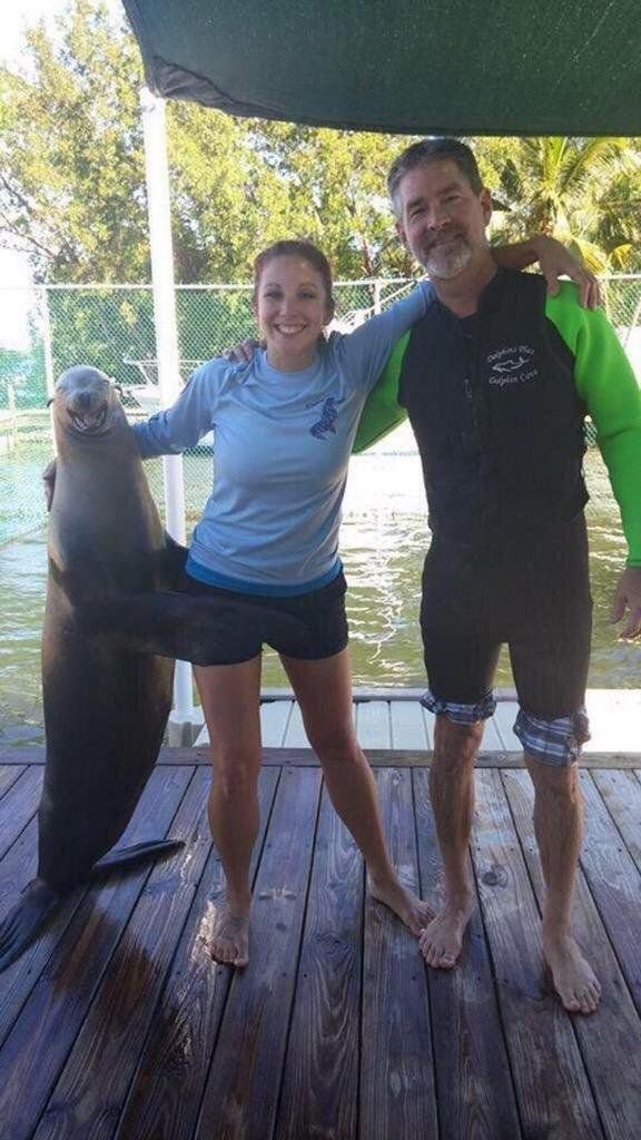 He grabbing her by the pussy, I guess he is happy lmao