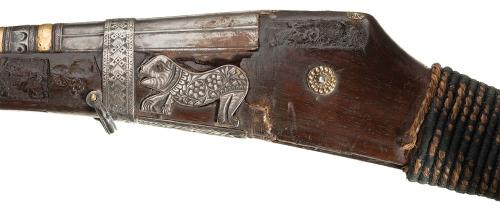 A silver decorated matchlock musket, 18th century.Rock Island Auction says its from the Mediterranea