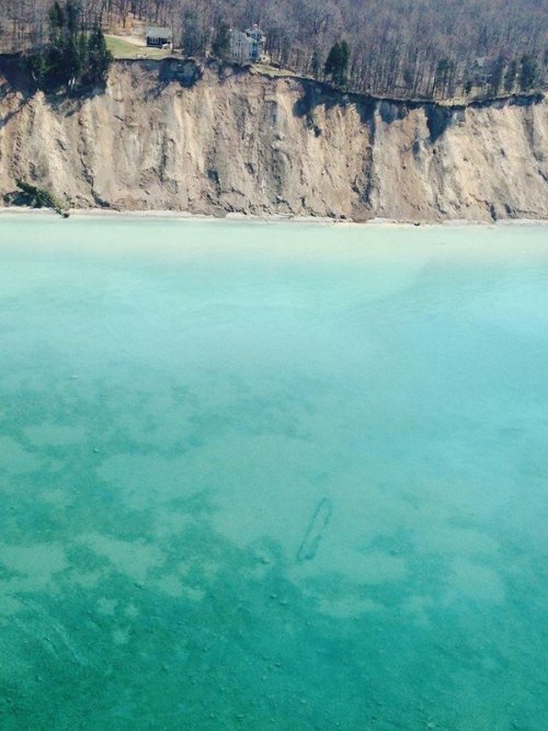 newsweek: Shipwrecks are now visible from beneath Lake Michigan after sheets of ice that built up ov