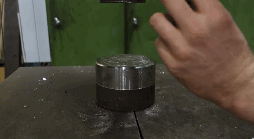 Watch: A Hydraulic Press Causes A Piece Paper Folded 7 Times To Explode Into Pieces.