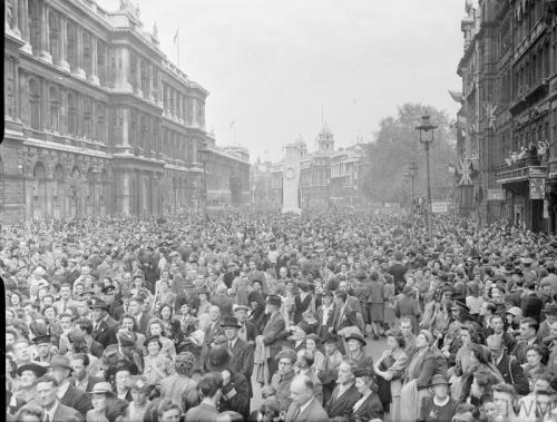 VE Day Celebrations in London (May 8th, 1945):A mounted policeman tries to clear a path for traffic.