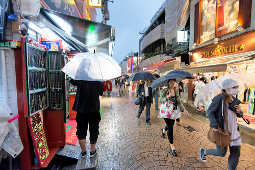 tokyo-fashion: Rainy night tonight on Takeshita Dori in Harajuku. The weather report for the next we