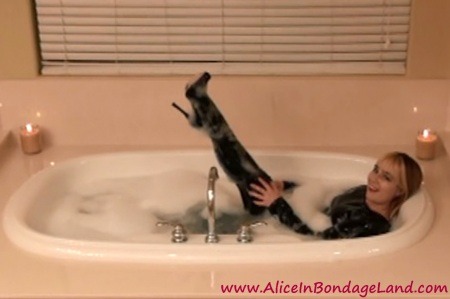 mistressaliceinbondageland:  BUBBLE BATH TIME!!! The only way to make a hot bath better is to enjoy it in RUBBER! More fetish movies putting FUN back into FemDom at http://www.aliceinbondageland.com 
