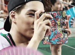 kaura-m:  Fanboy Jongin recording a soccer game ft. his spiderman phone cover 