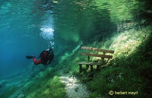 popfactory:  GREEN LAKE in Austria Grüner See (Green Lake) is a lake in Styria, Austria near the town of Tragöß. The lake is surrounded by the Hochschwab mountains and forests. The name “Green Lake” originated because of its emerald green