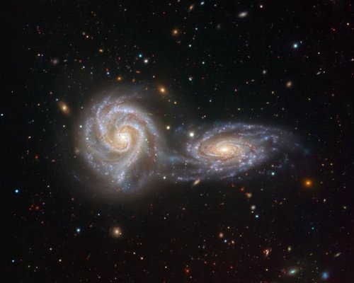 explorationimages: Colliding galaxies NGC 5426 and NGC 5427 from the ESO Very Large Telescope. Credi