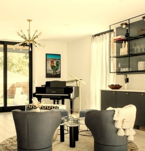 Miami Seated Bar Home BarExample Of A Mid-sized Trendy L-shaped Light Wood Floor Seated Home Bar Design