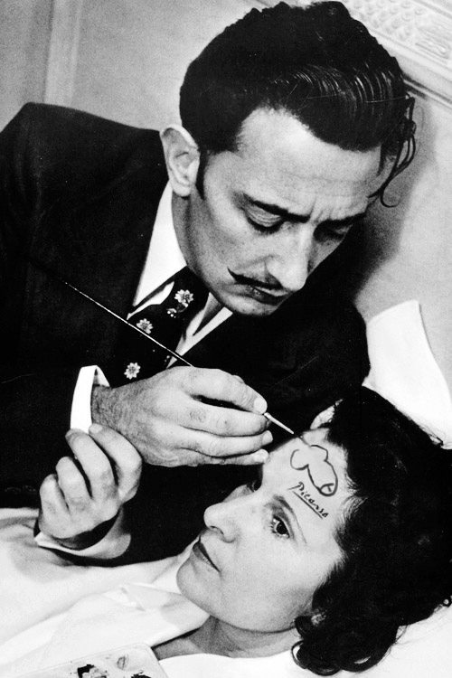 rejectnormality:  whiteteen:  Salvador Dali drawing a penis on the forehead of a woman and signing it with Picasso’s signature  oh 