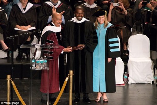 thisishiphoplifestyle:  Kanye West receiving his honorary Doctorate in Chicago.  “Hey Mama, I know act a fool, but I promise you I’m going back to school”.