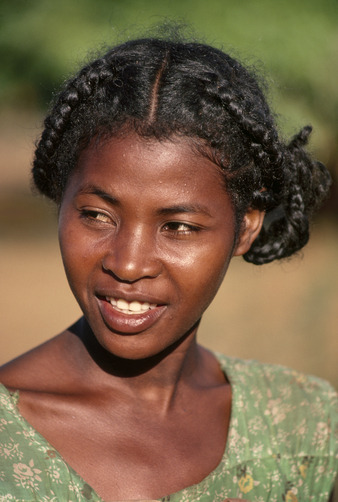   Madagascar: Portraits of Malagasy women of different ethnicities.  Names unknown. Photos by: Frans Lanting  