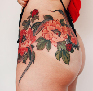 Snake and Peony Flower Tattoo by @yuuztattooer was originally published on IREZUMITATTOOS.COM