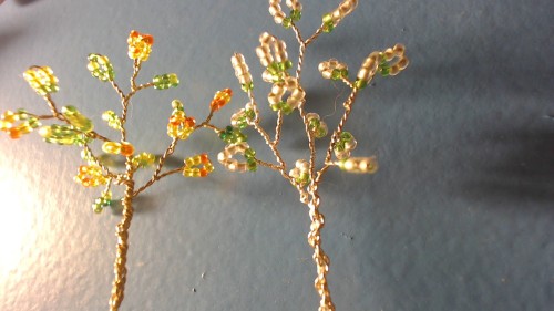 contemporaryelfinchild:Telperion and Laurelin that I made out of wire and beads.