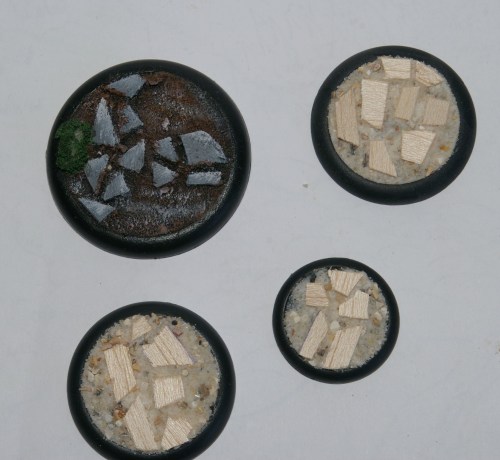 The bases for my remaining Warmachine models. One for the last Cinerator, one for the Repenter, one 