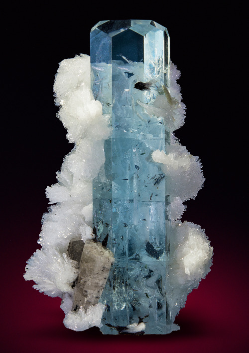 unearthedgemstones: A perfectly clear aquamarine with an excellent, modified termination is wearing 