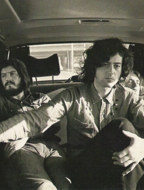 the-music-is-your-master:  babeimgonnaleaveu:  John Bonham, Jimmy Page and Robert Plant in the back 